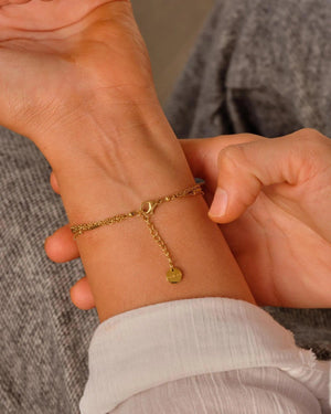 Elegant Waterproof Gold Stainless Steel Layered Bracelet - Dainty Stackable Design for Women.