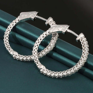 Stunning 14K Solid White Gold Half Eternity Huggie Hoop Earrings with 0.52 CTW Real Diamonds.