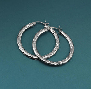 Elegant 35mm Sterling Silver Skinny Hoop Earrings.
