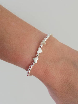 Charming Silver Heart Stretch Bracelet - Perfect Beaded Stacking Gift for Girlfriend or Teacher.