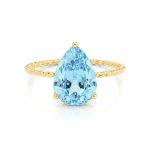 Stunning 14K Yellow Gold Pear-Cut Sky Blue Topaz Ring – The Perfect Elegant Birthstone Gift for Any Occasion.