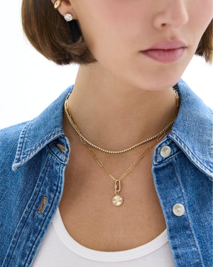 Elegant Fluted Round Diamond Pendant.