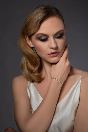 Elegant Dainty Silver CZ Slider Bracelet with Pear-Shaped Cubic Zirconia – Adjustable for Women & Girls.