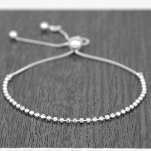 Elegant Sterling Silver Adjustable Minimalist Slider Bracelet with 2mm Beads for Women.