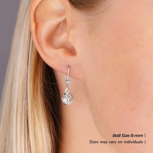 Stunning 14K White Gold Hand Engraved Diamond-Cut Round Ball Dangle Earrings with Secure French Leverbacks.