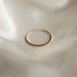 Stunning Solid Gold Topaz Eternity Ring - A Timeless Treasure.