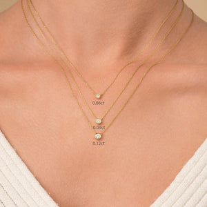 Elegant 14K Gold Diamond Solitaire Necklace - Minimalist Bezel Setting for Timeless Style.