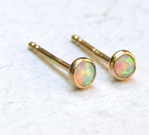 Dazzling 14K Yellow Gold Opal Stud Earrings - Adorable 3mm White Opal for Everyday Elegance and Special Occasions.