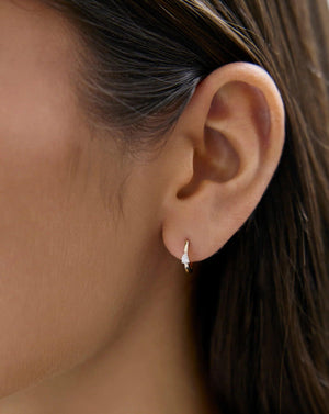 Stunning Mini Pear Diamond Huggies for Effortless Elegance.