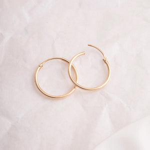 Elegant 14K Gold Hoop Earrings - Dainty Thin Wire Hoops in Small, Medium, and Large for Everyday Wear.