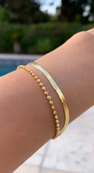 Stunning 14K Solid Gold Herringbone Bracelet - Elegant 2.5mm Italian Liquid Link Design for Women.