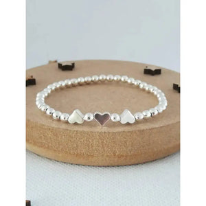 Charming Silver Heart Stretch Bracelet - Perfect Beaded Stacking Gift for Girlfriend or Teacher.