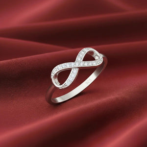 Sparkling Sterling Silver Infinity Ring with Simulated Diamonds – A Timeless Gift for Her on Any Occasion.