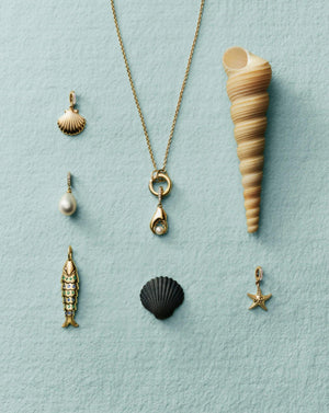 Pinch Me Pearl Charm.