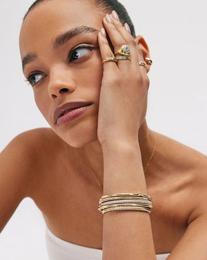 Elegant Stackable Gold Cloud Bangle - Elevate Your Style.