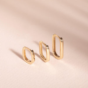 Elegant Solid Gold Paperclip Hoop Earrings in 10K, 14K & 18K – Modern Oval Design for Everyday Luxury & Special Occasions.
