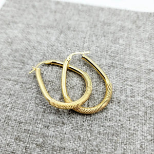 Elegant 10K Yellow Gold Textured Oval Hoop Earrings - Timeless Everyday Style.
