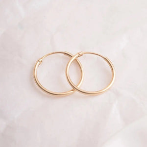 Elegant 14K Gold Hoop Earrings - Dainty Thin Wire Hoops in Small, Medium, and Large for Everyday Wear.