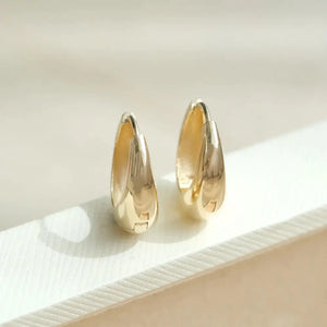Elegant 14K Solid Gold Tapered Oval Huggie Hoop Earrings for Daily Wear.