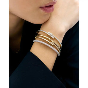 Elegant Baguette and Round Diamond Wrap Bangle.