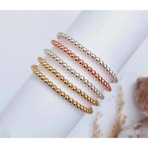 Elegant Gold Rose Silver Beaded Stacking Bracelets - 14K Gold Plated Elastic Design.