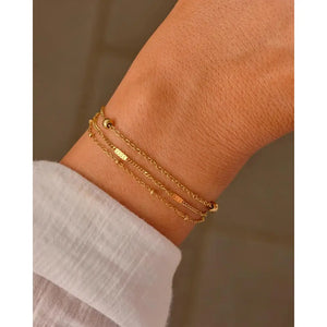 Elegant Waterproof Gold Stainless Steel Layered Bracelet - Dainty Stackable Design for Women.