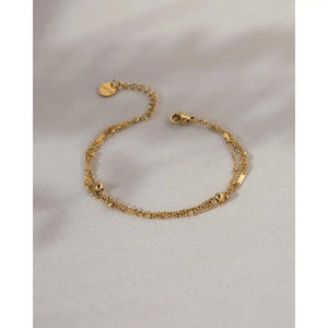 Elegant Waterproof Gold Stainless Steel Layered Bracelet - Dainty Stackable Design for Women.