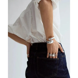 Elegantly Curved Coco Bangle.