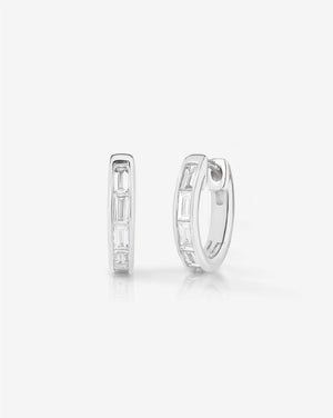 Stunning Baguette Channel-Set Huggie Earrings.