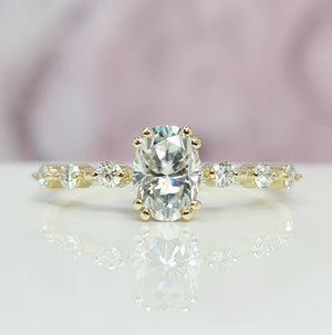 1 Carat Oval Cut Lab Grown Diamond Engagement Ring in 14K Yellow Gold.