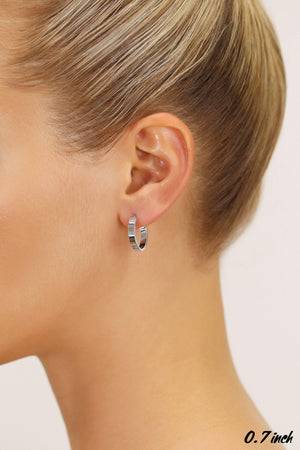 14K White Gold Elegant Small Oval Hoop Earrings - 0.7 Inch Classic Shine.