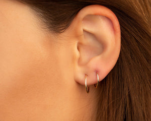Chic 14K Solid Gold Endless Hoop Earrings - Elegant Tiny Huggie Hoops for Every Occasion.