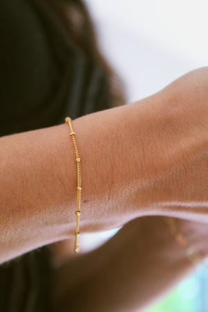 Elegant Gold Satellite Bracelet - Dainty Beaded Chain for a Minimalist Gift She'll Adore.