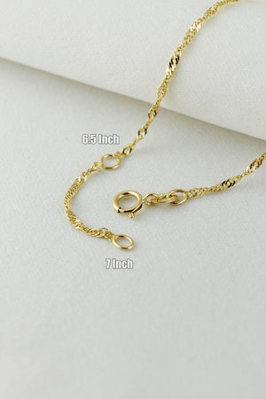 Elegant 10K Solid Gold Twisted Chain Bracelet - Dainty and Stackable Everyday Essential for Women.