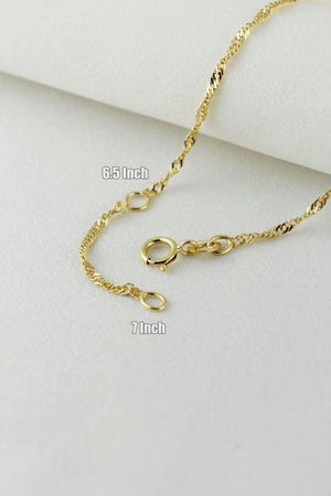 Elegant 10K Solid Gold Twisted Chain Bracelet - Dainty and Stackable Everyday Essential for Women.