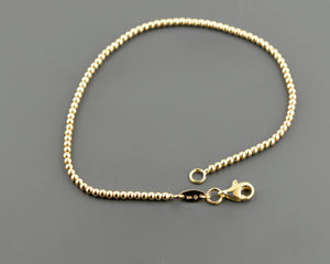 Elegant 14K Yellow Gold 2.0mm Bead Bracelet – 7.5 Inch with Secure Lobster Clasp.