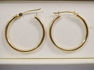Elegant 10K Yellow Gold Polished 2mm Hoop Earrings for Women.