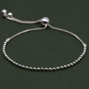 Elegant Sterling Silver Adjustable Minimalist Slider Bracelet with 2mm Beads for Women.