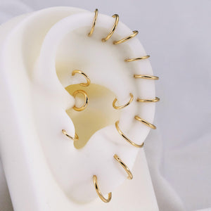 Luxurious 14K Solid Gold Seamless Hinged Clicker Hoop for Tragus, Helix, Conch, Nose, and Earlobe Piercings.