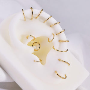 Luxurious 14K Solid Gold Seamless Hinged Clicker Hoop for Tragus, Helix, Conch, Nose, and Earlobe Piercings.