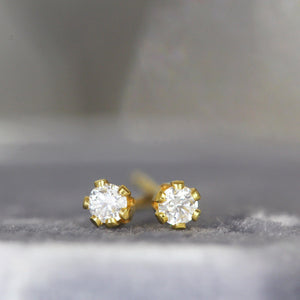 Stunning 2mm White Diamond Stud Earrings in Yellow Gold - Perfect Fine Jewelry Gift for Any Occasion.