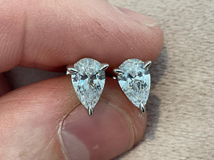 2.0 Carat Pear Cut Lab Created Diamond Earrings: Sterling Silver Platinum Overlay