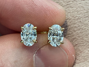 2.0 Carat Lab Created Diamond Oval Cut Set in 925 Sterling Silver and Gold Plated Overlay Hallmarked.