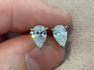 2.0 Carat Pear Cut Lab Created Diamond Earrings: Sterling Silver Platinum Overlay