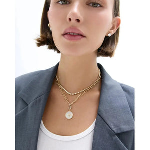 Radiant Mother of Pearl Star Pendant - Elegant Celestial Jewelry.