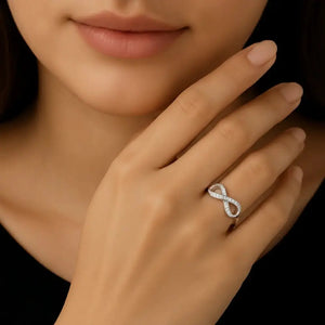 Sparkling Sterling Silver Infinity Ring with Simulated Diamonds – A Timeless Gift for Her on Any Occasion.