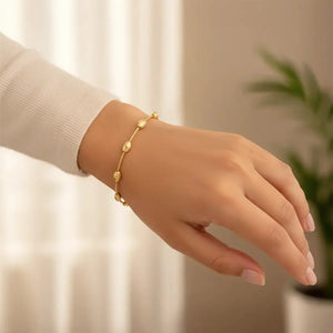Sterling Silver Gold Plated Diamond-Cut Oval Bead Bracelet