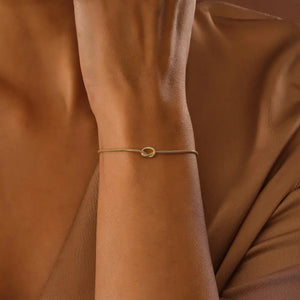 Stunning 14K Gold Love Knot Bracelet for Couples - Elegant Friendship Snake Chain Gift.