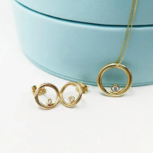 Stunning 9ct Yellow Gold Diamond Twist Pendant & Earrings Set - Exquisite Continuum Design Jewelry for Women.