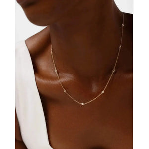Stunning Diamond Bezel Station Necklace for Timeless Elegance.